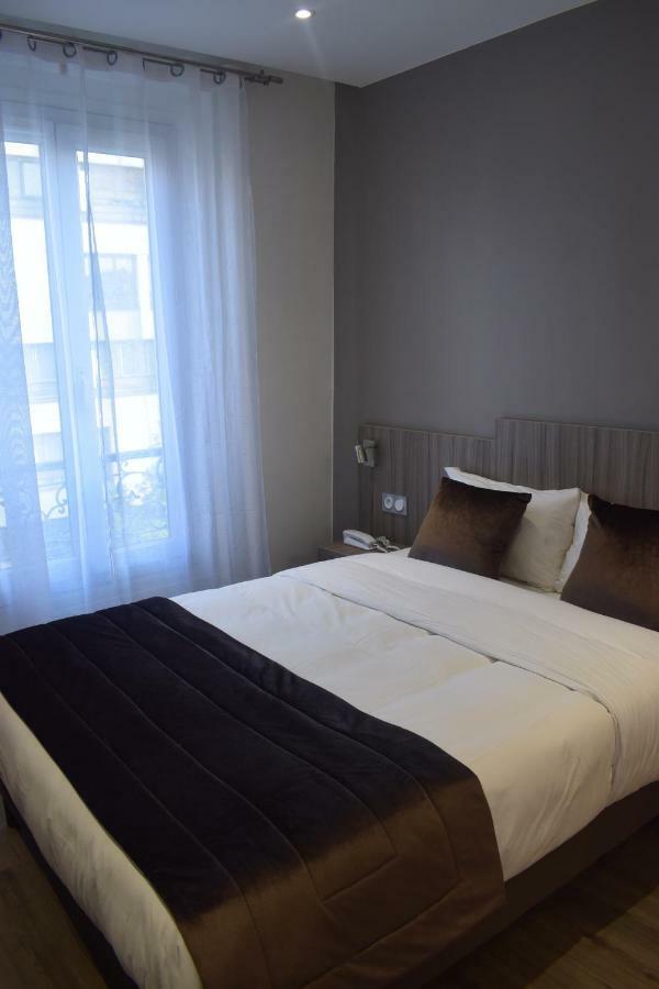 Hotel Puy De Dome Paris Bagian luar foto