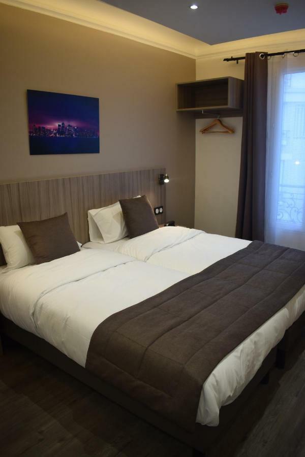 Hotel Puy De Dome Paris Bagian luar foto